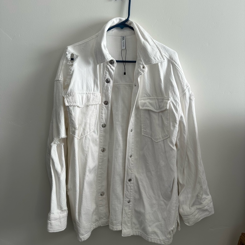 White denim Zara jacket with tears